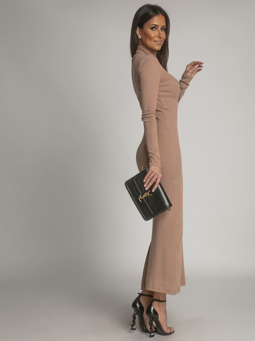 Cotton fitted maxi dress in cappuccino color with a stylish turtleneck, showcasing its soft fabric and elegant design.