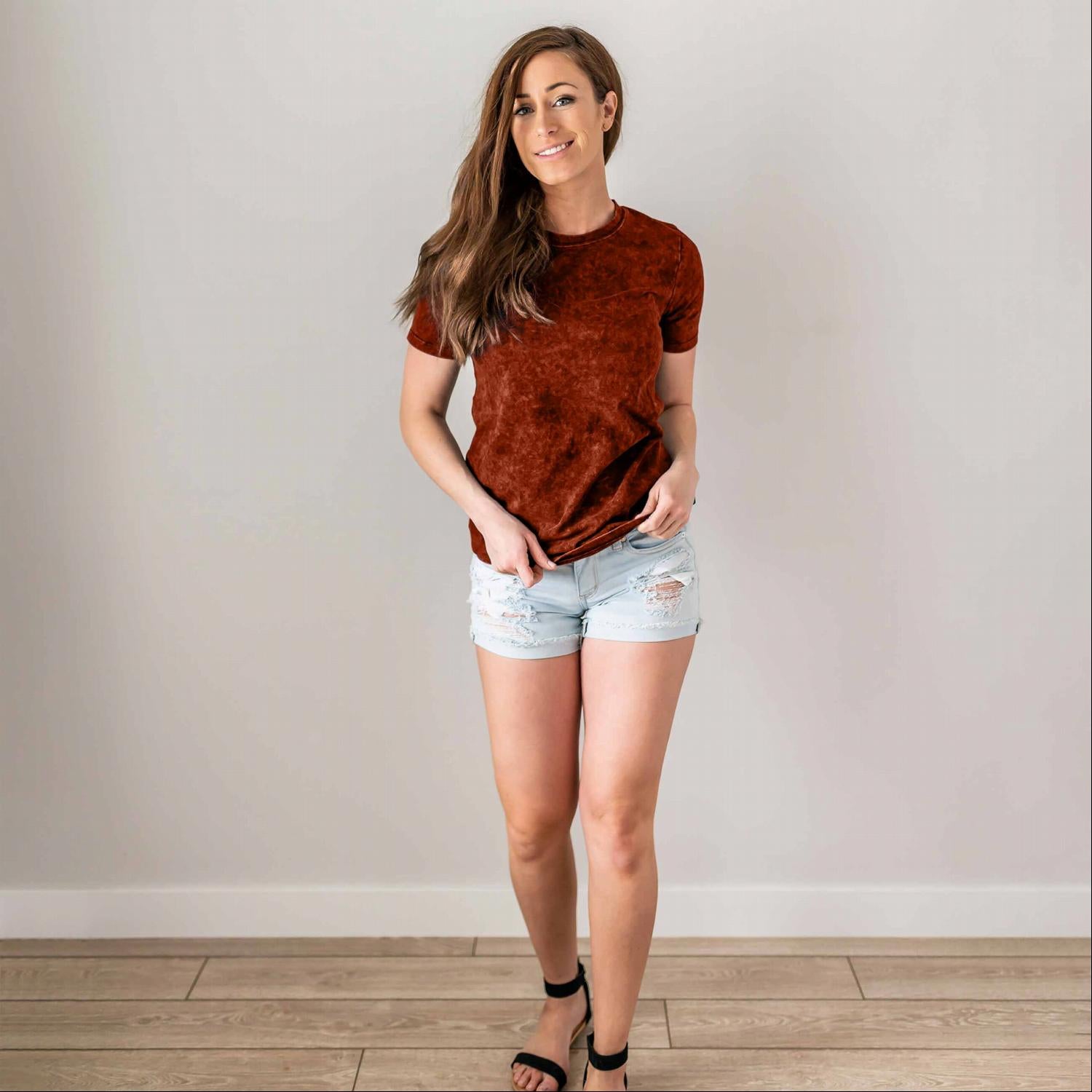 A stylish Cotton Short Sleeve Round Neck Top in solid color, showcasing its scoop neck design and short sleeves, perfect for summer wear.