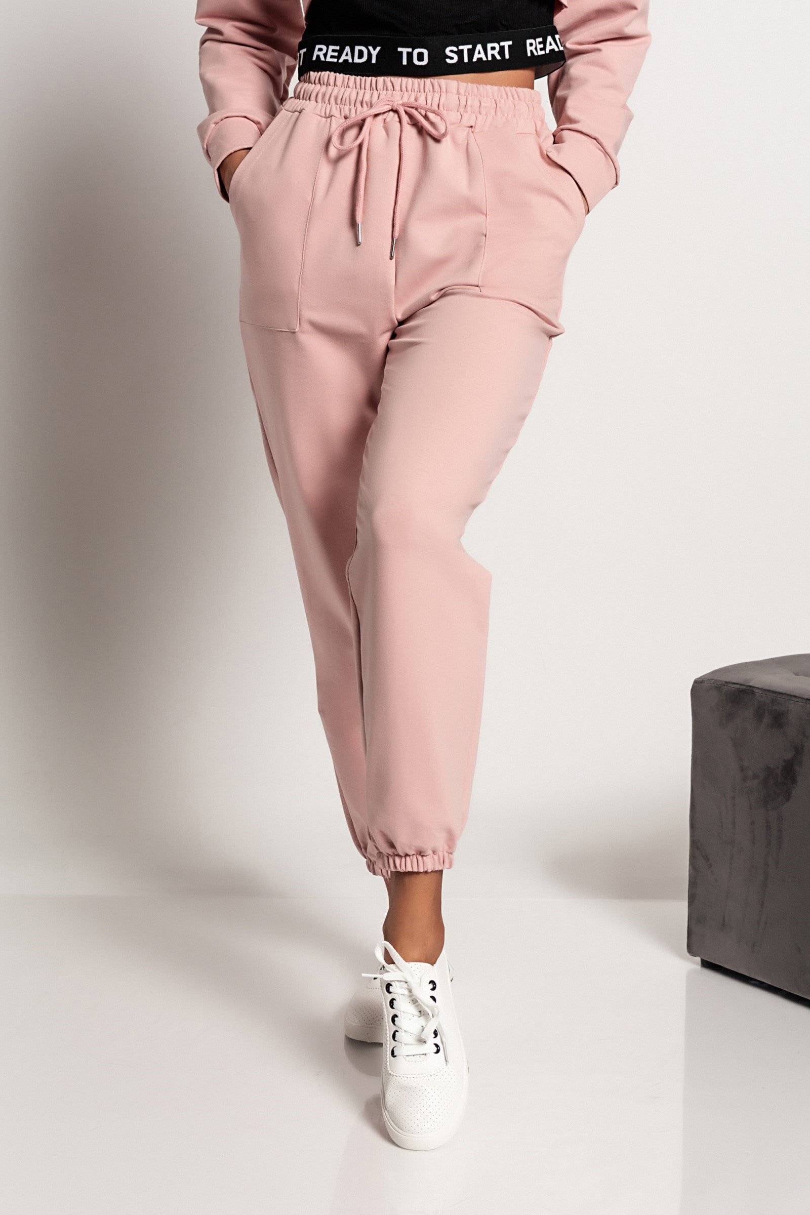 Light pink cotton sports pants Feroleta with elastic waist, drawstring, and side pockets, designed for comfort and style.