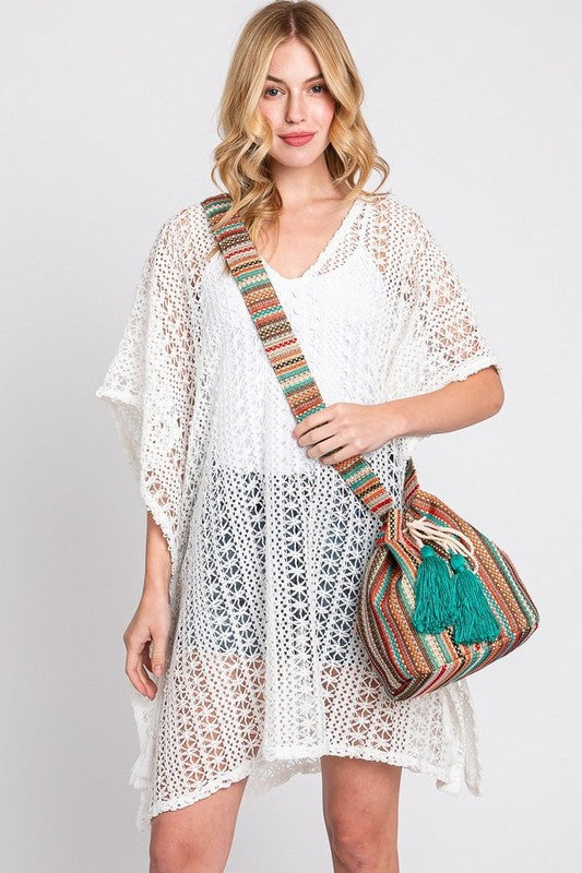 Cotton Tassel Boho Bucket Bag featuring stylish tassels and spacious design.