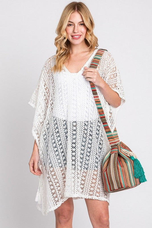 Cotton Tassel Boho Bucket Bag featuring stylish tassels and spacious design.