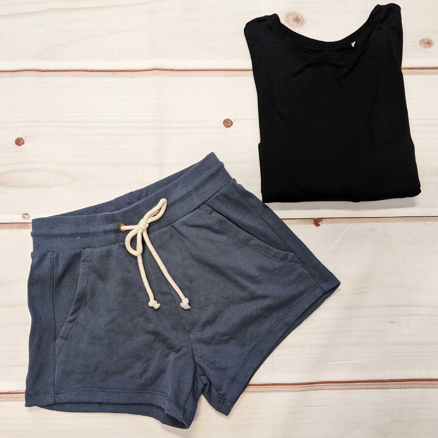 A pair of Cotton Terry Basic Shorts in a soft cotton blend, featuring a drawstring waist and side pockets, perfect for casual wear.