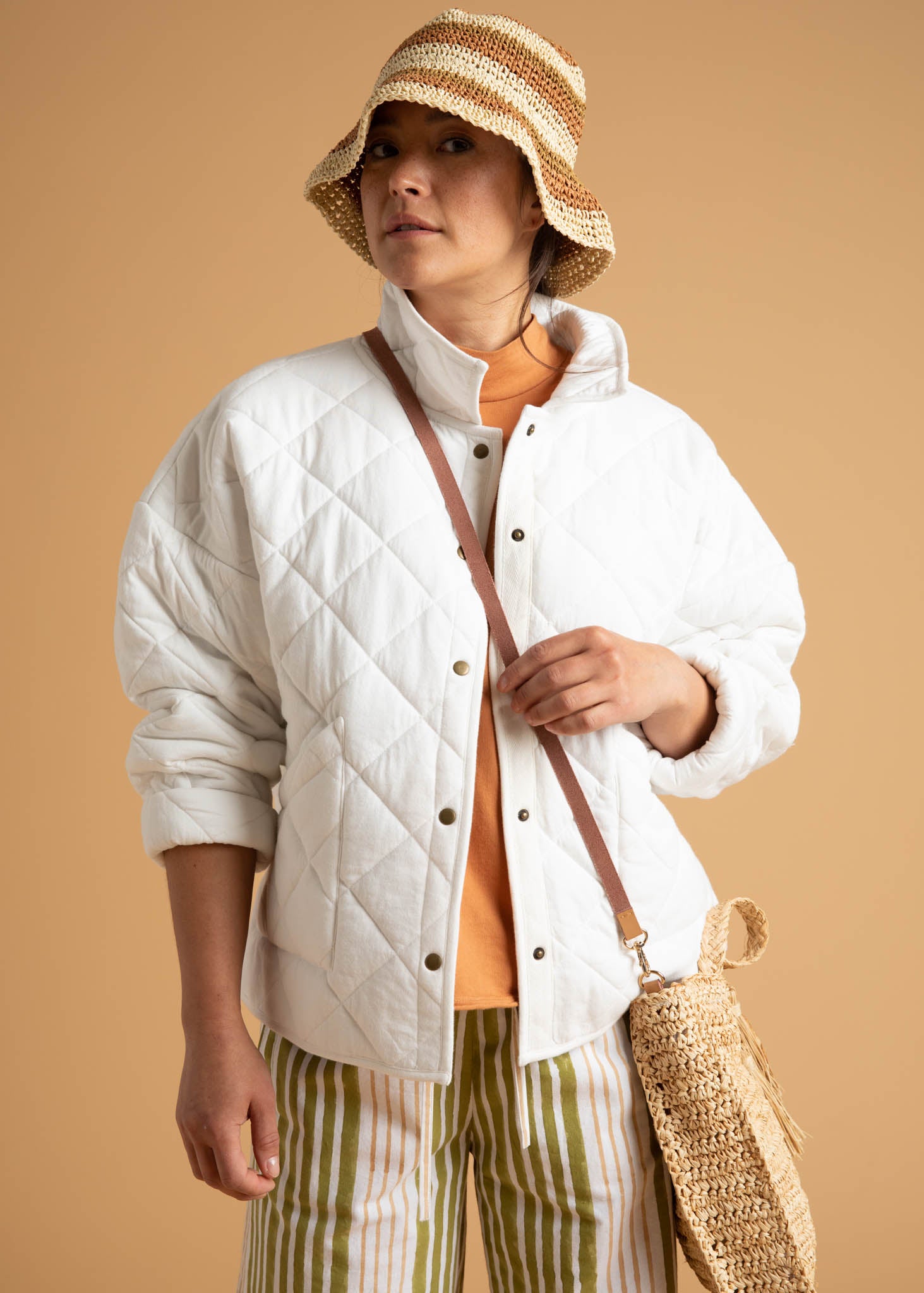 Countryside Quilted Jacket in Natural color, featuring quilted stitching, front slip pockets, and a relaxed fit, perfect for layering.