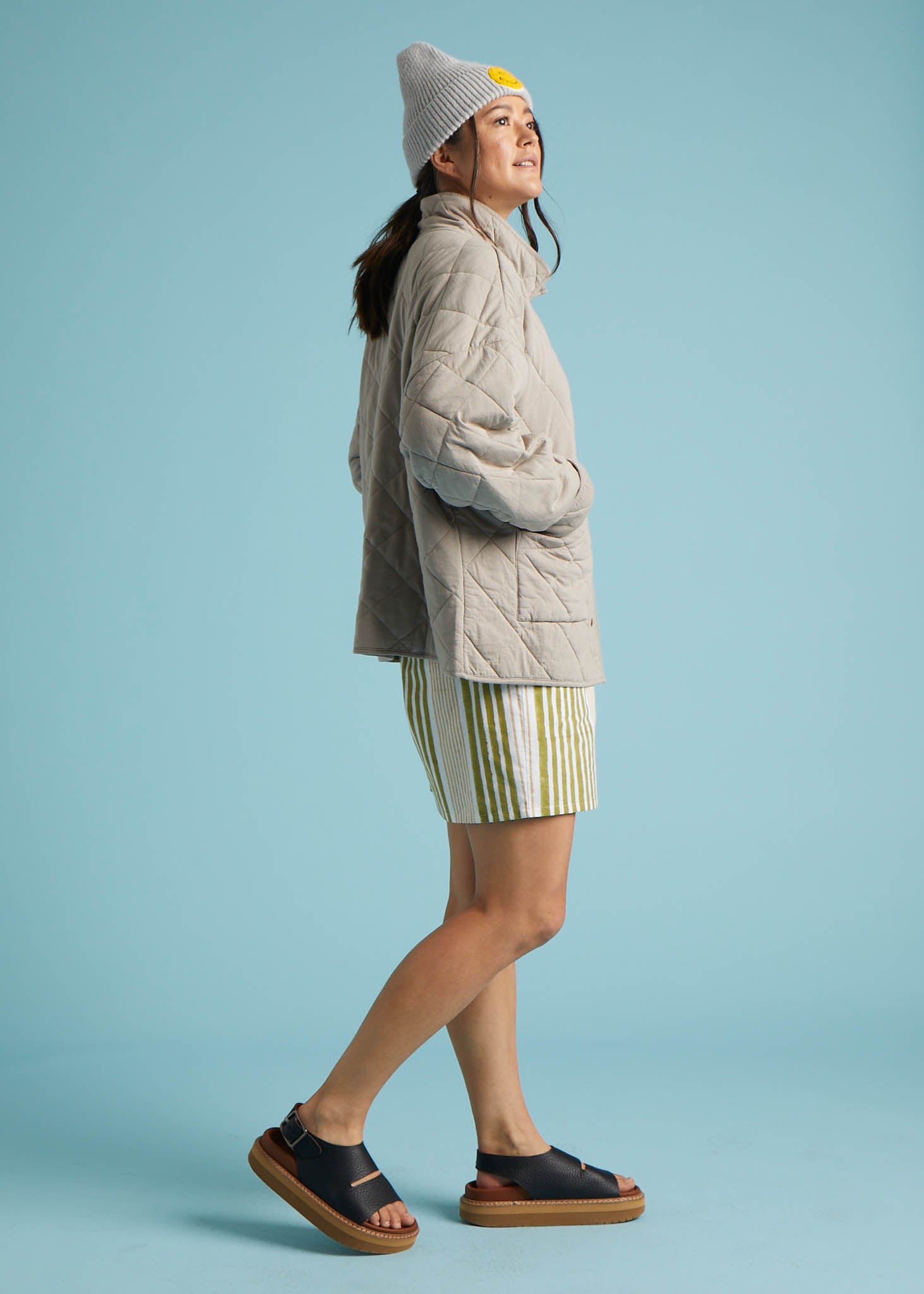 A stylish Countryside Quilted Jacket in Pebble color, featuring quilted stitching, front slip pockets, and a relaxed design, perfect for layering.