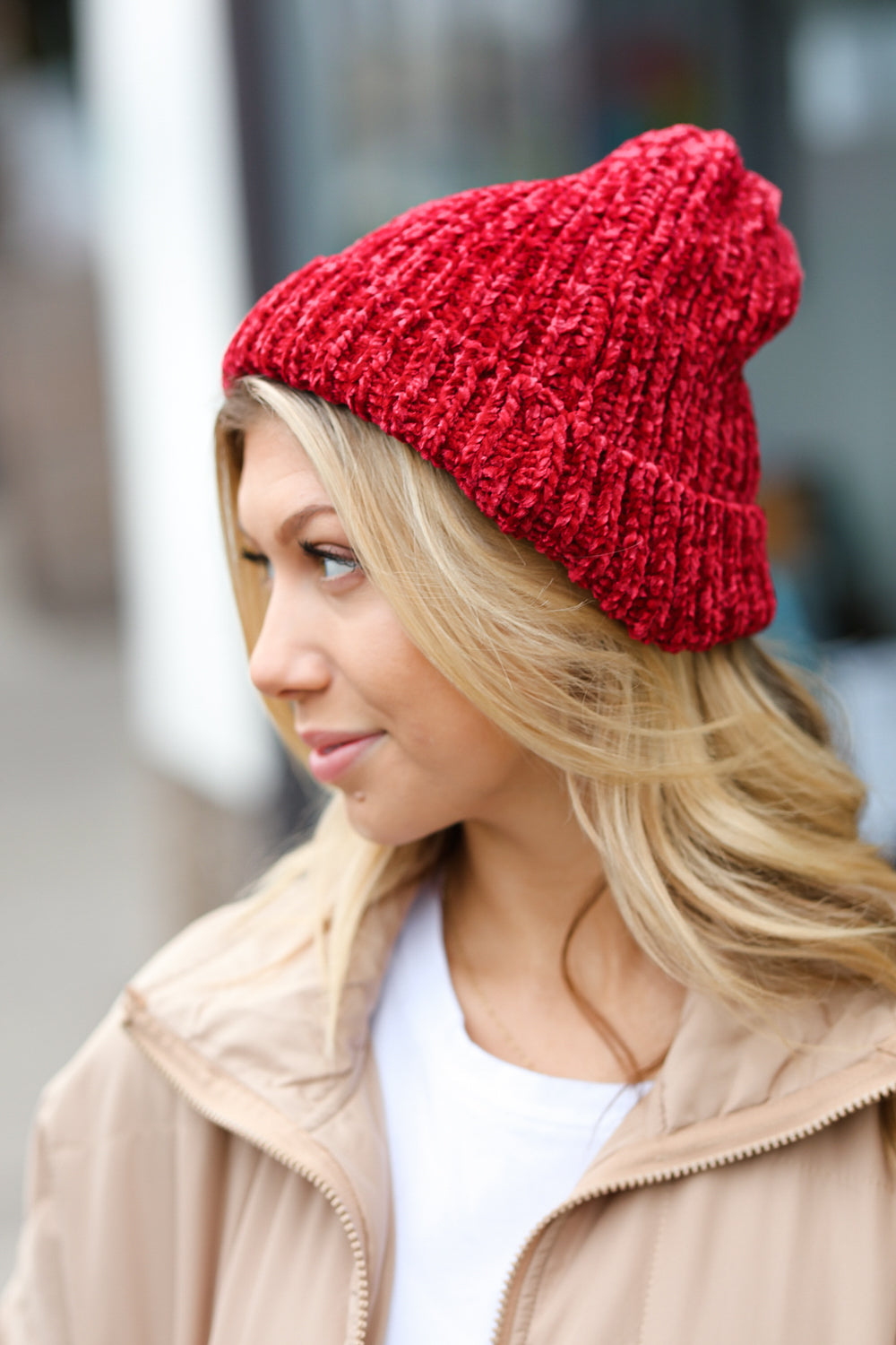 Cranberry Knit Velvet Chenille Fold Over Beanie displayed on a neutral background, showcasing its soft texture and vibrant color.