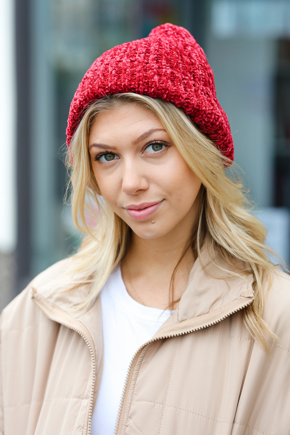 Cranberry Knit Velvet Chenille Fold Over Beanie displayed on a neutral background, showcasing its soft texture and vibrant color.