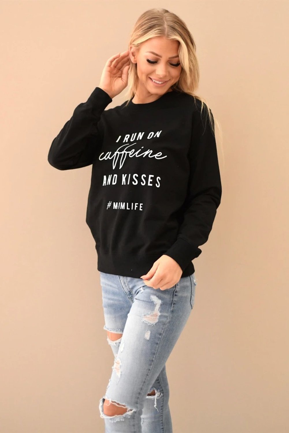 A stylish crew neck sweatshirt featuring a fun letter print design, perfect for casual wear and lounging, displayed in a relaxed fit.