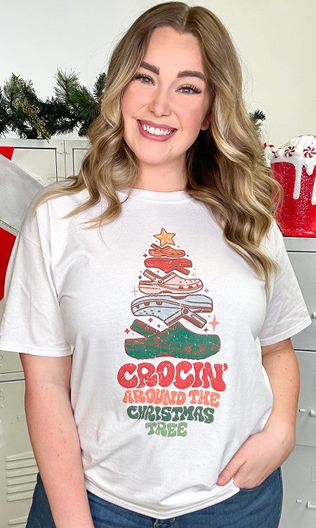 Crockin' Around the Christmas Tree Graphic T-Shirt featuring a colorful croc design shaped like a Christmas tree.