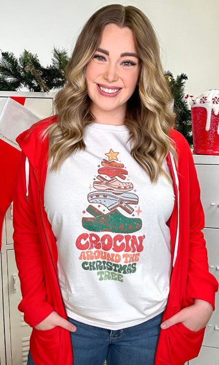 Crockin' Around the Christmas Tree Graphic T-Shirt featuring a colorful croc design shaped like a Christmas tree.