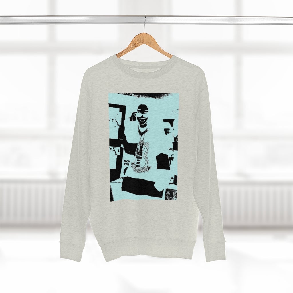 A stylish cropped sweatshirt made from soft cotton and polyester blend, featuring a relaxed fit and tear-away label.