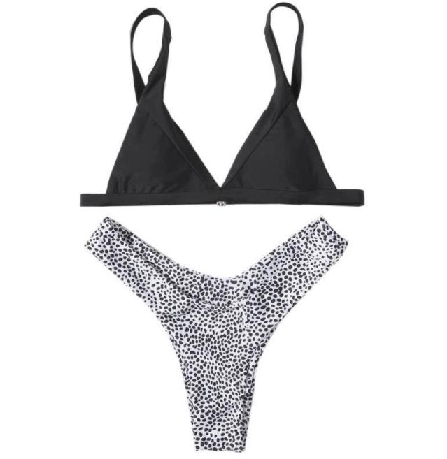 The Crystal two-piece swimsuit featuring animal print design and high-cut bottoms, perfect for summer wear.