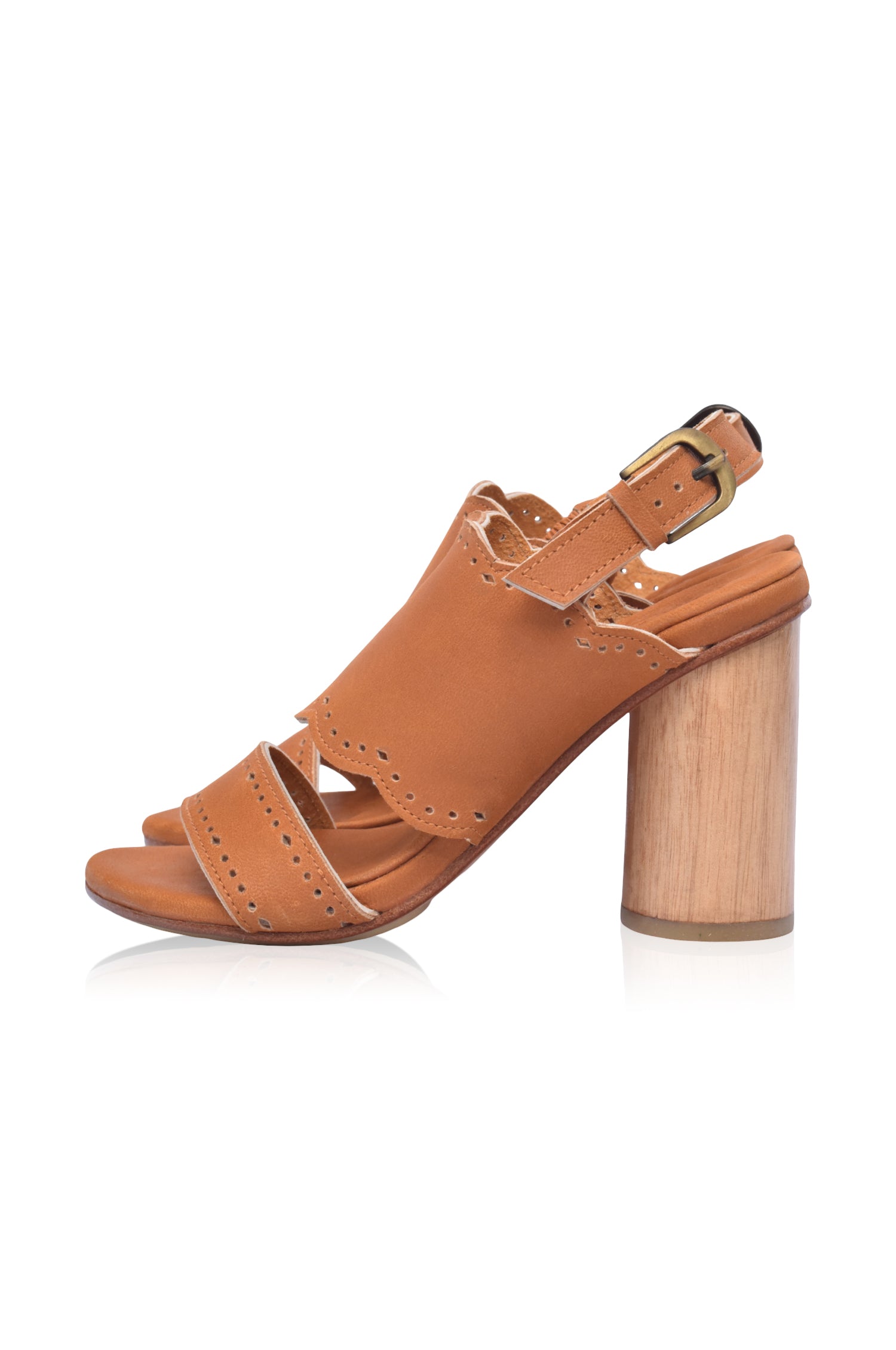 Elegant Crystal Glow leather heels with scalloped edges and wooden heel, showcasing their stylish design.