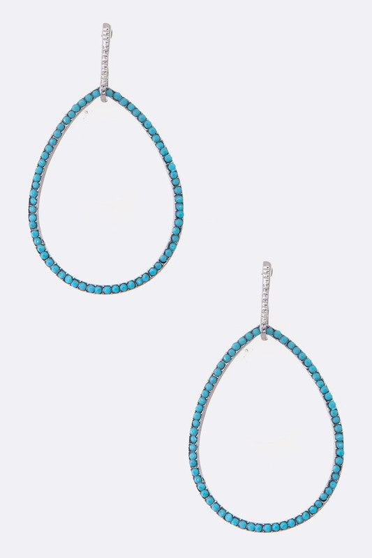 Elegant Crystal Pave Teardrop Hoop Earrings with a 2-inch drop, featuring sparkling crystals in a stylish teardrop design.