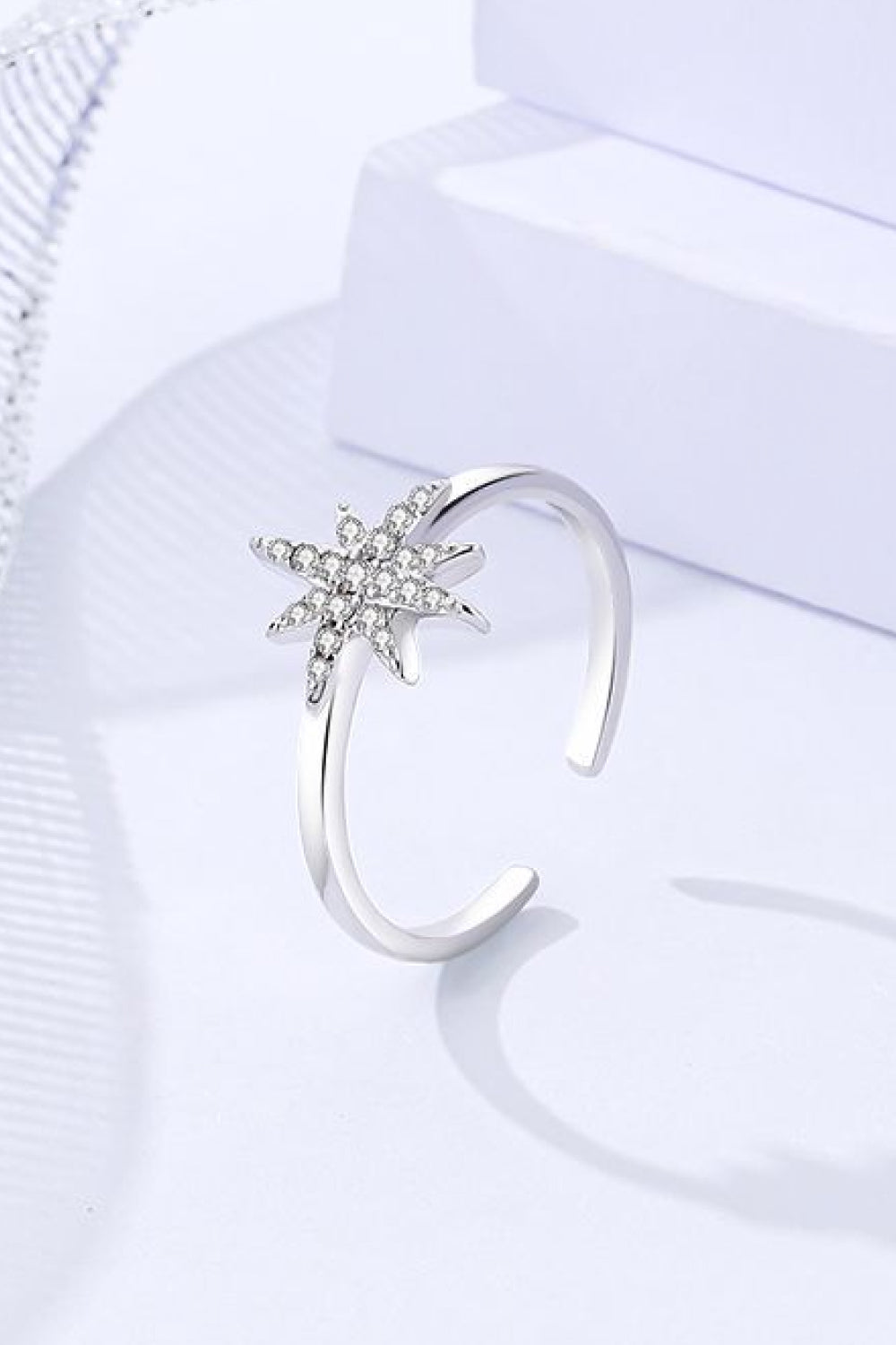 Cubic Zirconia Star Open Ring made of 925 silver, featuring a polished finish and sparkling star design.