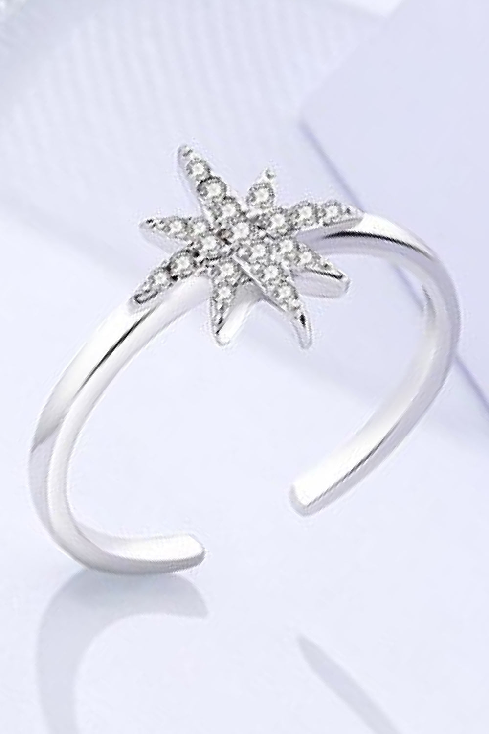 Cubic Zirconia Star Open Ring made of 925 silver, featuring a polished finish and sparkling star design.