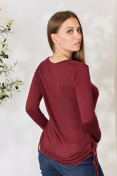 Culture Code Full Size Drawstring Round Neck Long Sleeve Top in a stylish design, featuring adjustable drawstring and long sleeves.