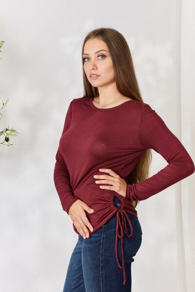 Culture Code Full Size Drawstring Round Neck Long Sleeve Top in a stylish design, featuring adjustable drawstring and long sleeves.