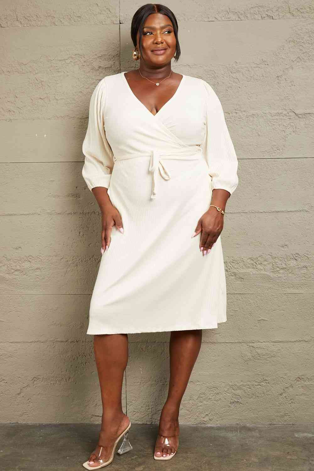 Culture Code Full Size Surplice Flare Ruching Dress featuring a wrap-style design, elegant ruching sleeves, and a flattering A-line silhouette.