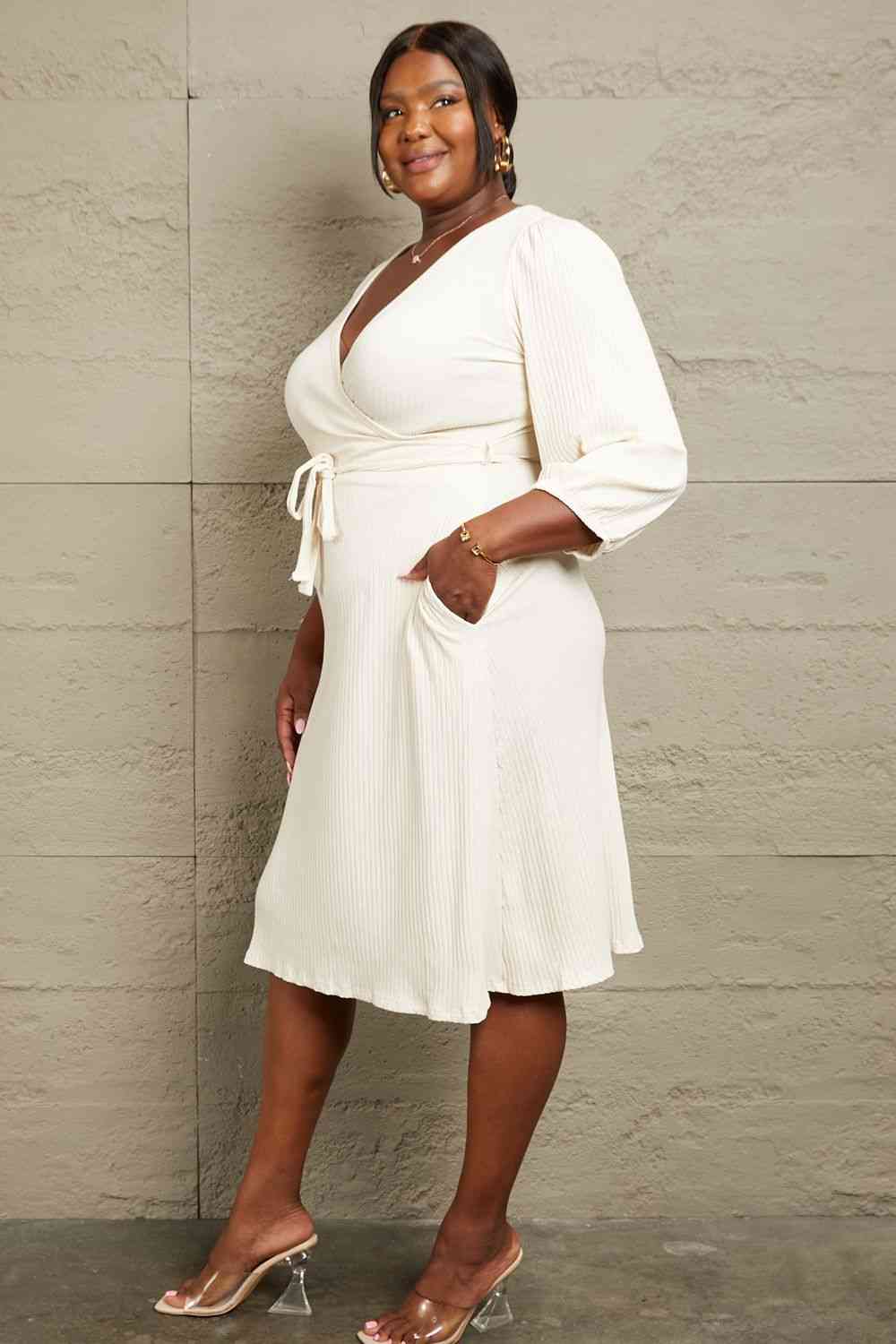 Culture Code Full Size Surplice Flare Ruching Dress featuring a wrap-style design, elegant ruching sleeves, and a flattering A-line silhouette.