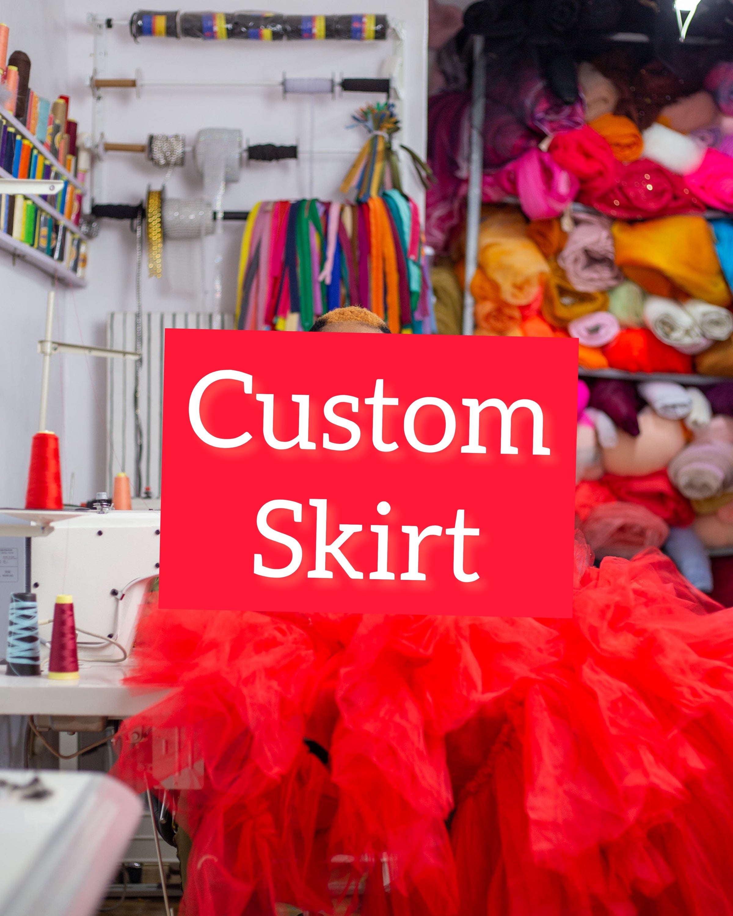 Custom skirt featuring a stretchy fit and a flowing tulle bottom layer, perfect for stylish occasions.