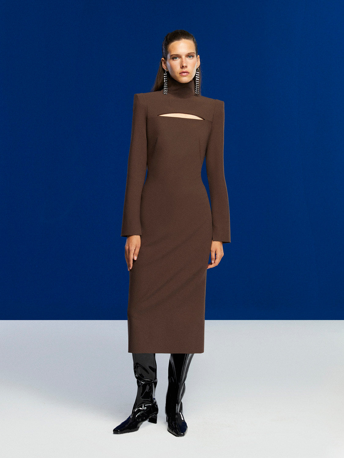 Cut Out Midi Dress in Neo Brown featuring turtleneck, shoulder pads, and long sleeves with slit cuffs.