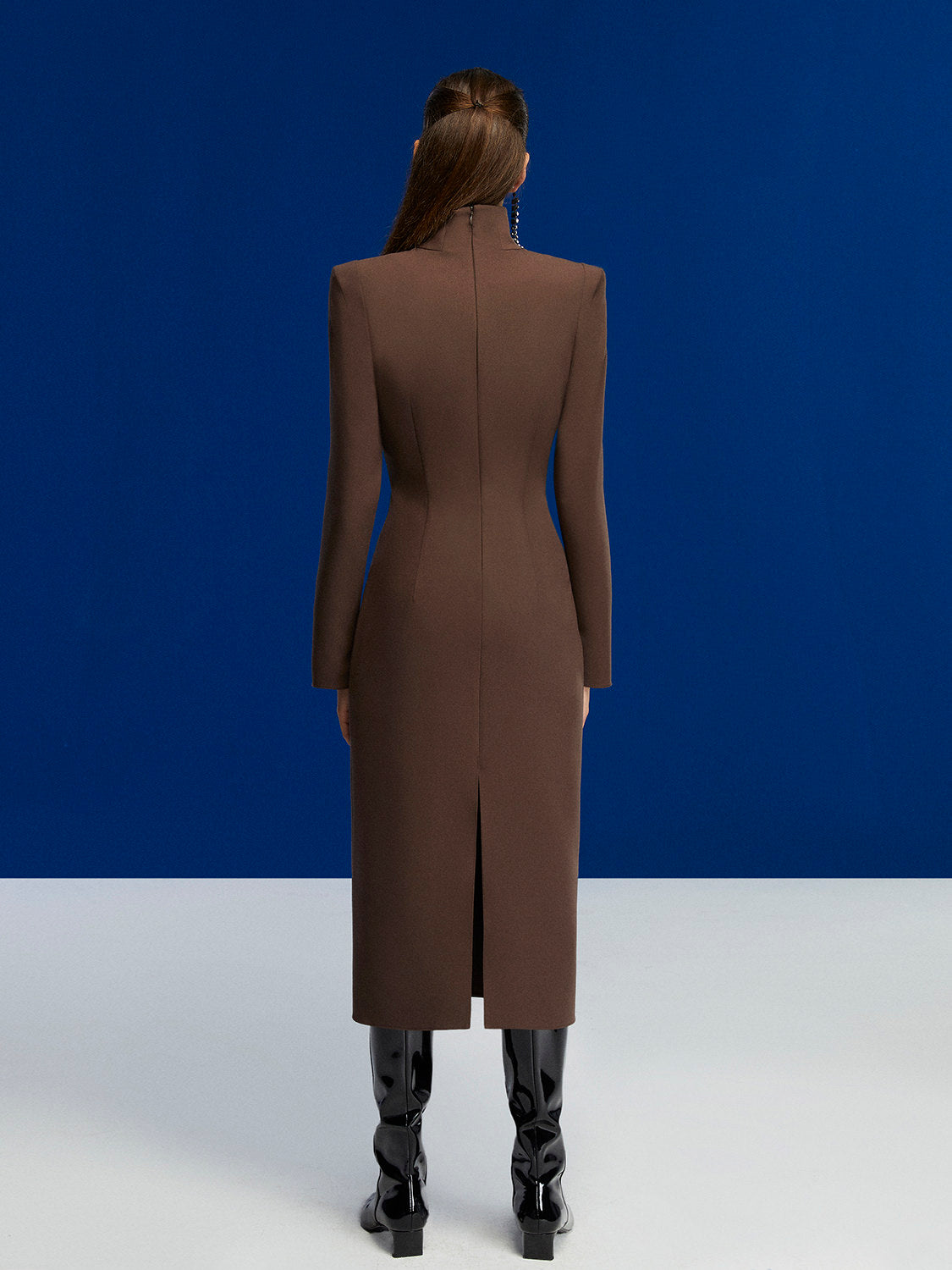 Cut Out Midi Dress in Neo Brown featuring turtleneck, shoulder pads, and long sleeves with slit cuffs.