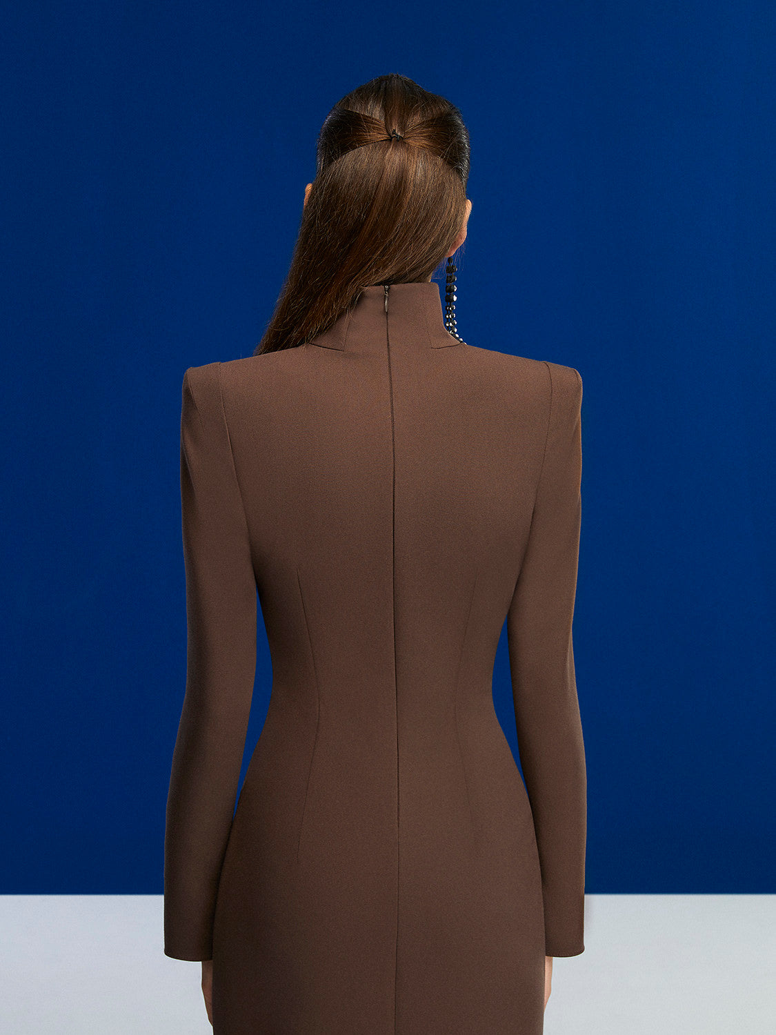 Cut Out Midi Dress in Neo Brown featuring turtleneck, shoulder pads, and long sleeves with slit cuffs.