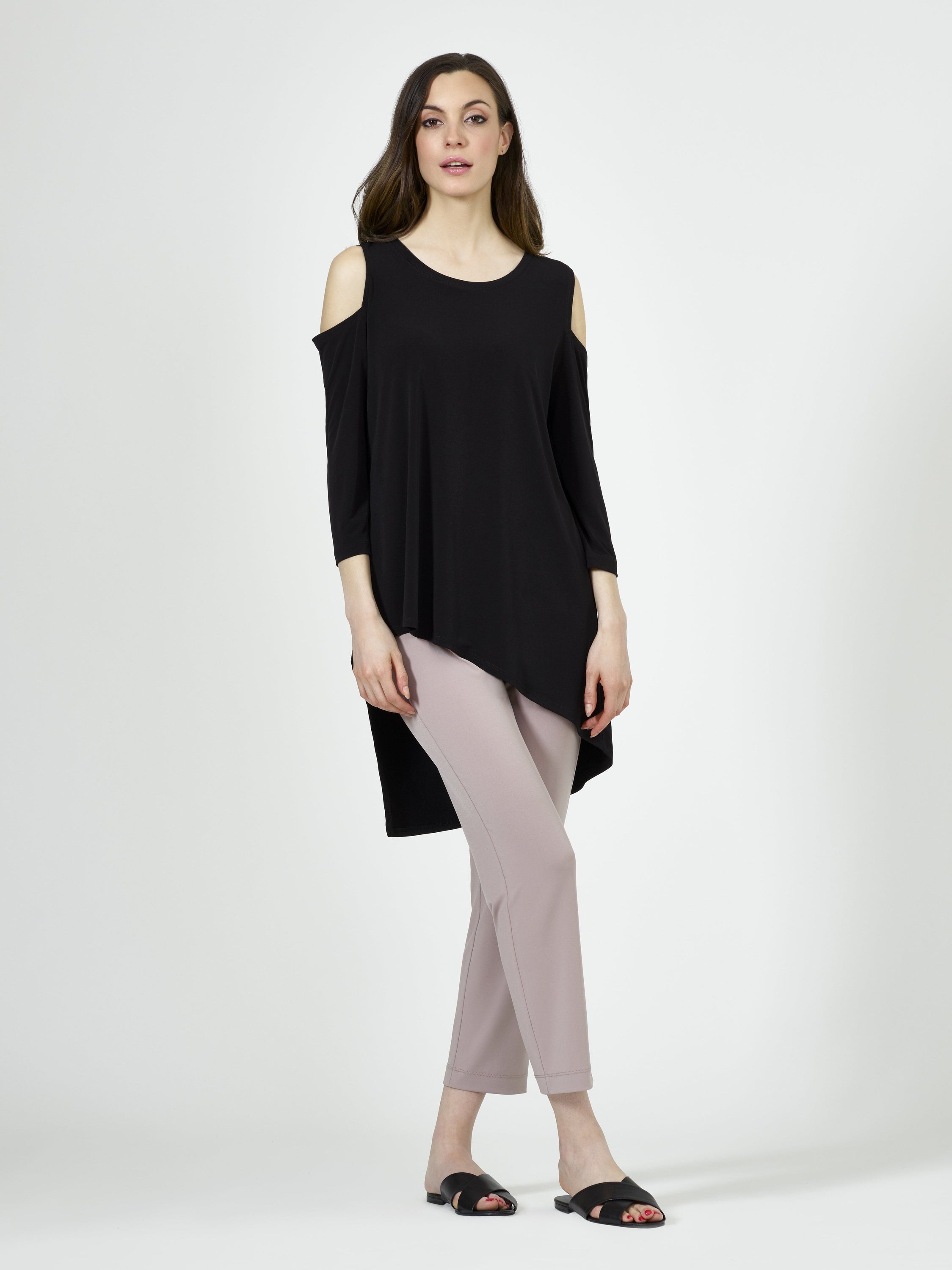 A stylish Cut Out Shoulder Asymmetrical Tunic featuring a scoop neck, open shoulder detail, and a unique asymmetrical hemline in a relaxed fit.