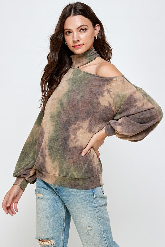 A stylish CUT OUT TIE DYE TOP featuring a vibrant tie-dye pattern, cut-out shoulder design, mock neck, and balloon sleeves.