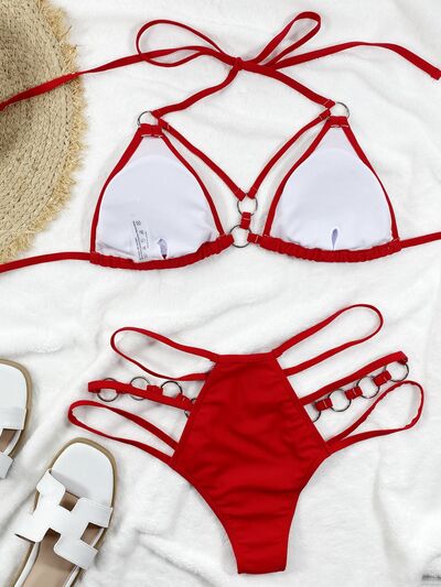 Cutout Halter Neck Two-Piece Bikini Set featuring stylish cutouts and removable padding, perfect for summer beach outings.