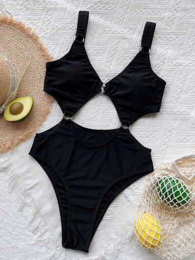 Cutout Plunge One-Piece Swimwear featuring a stylish design with removable padding and stretchy fabric, perfect for summer beach outings.