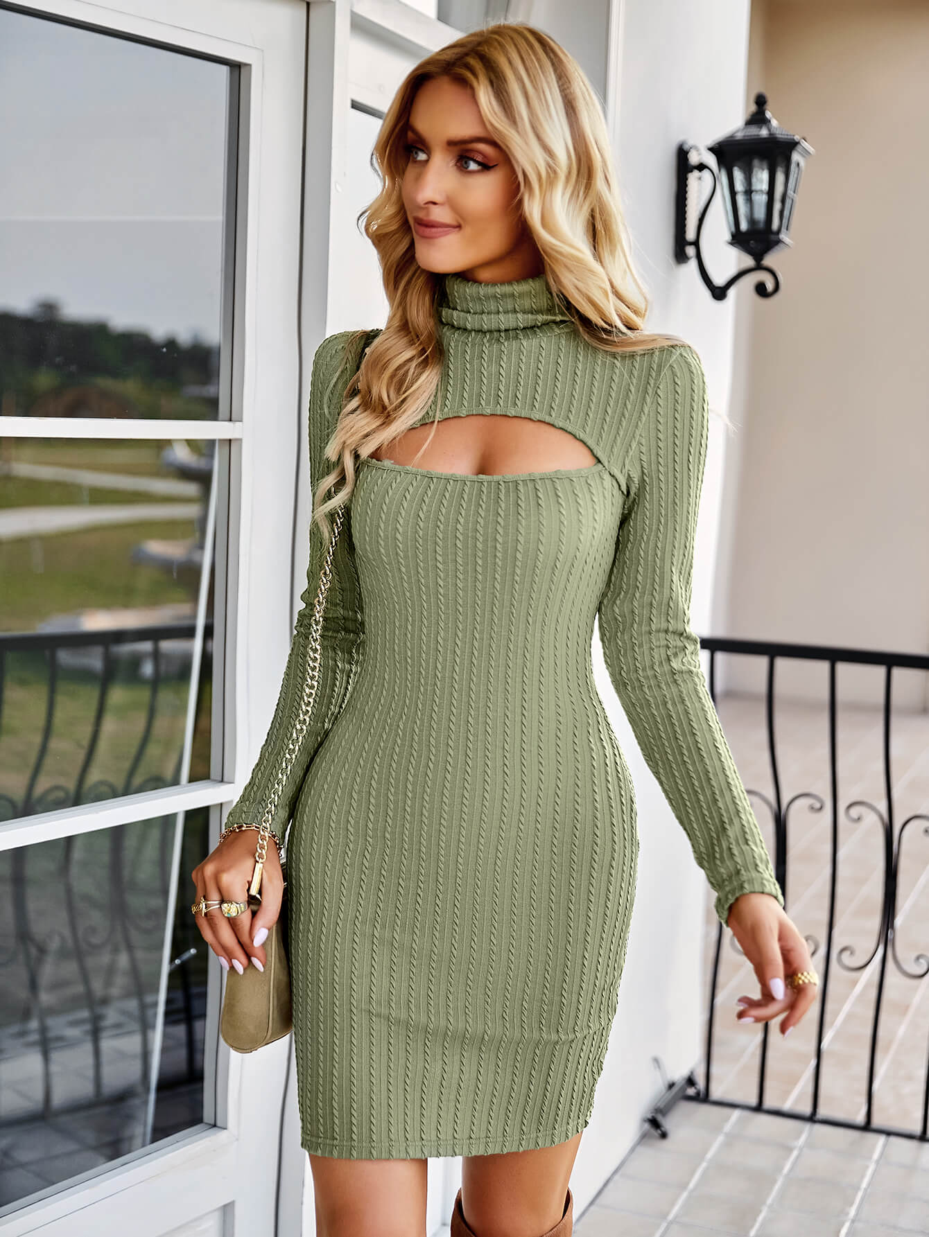 Cutout Textured Turtleneck Knit Dress in a chic outdoor setting, showcasing its stylish design and ribbed texture.