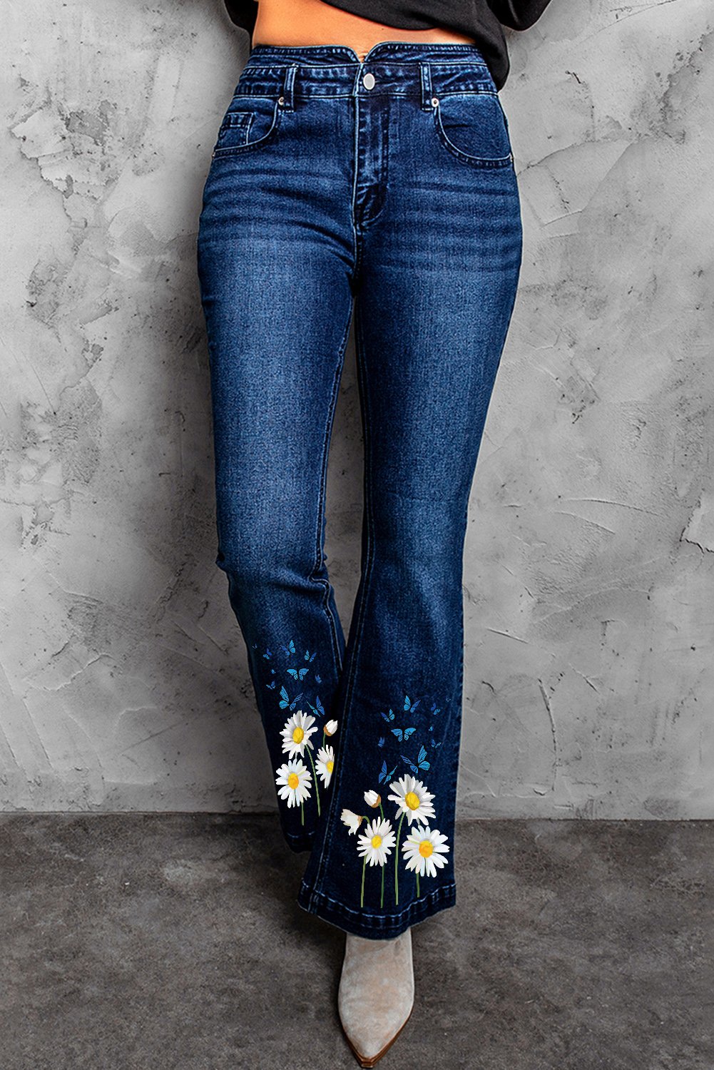 Daisy Print High Waist Flare Jeans showcasing a stylish floral pattern and a flattering high waist design.