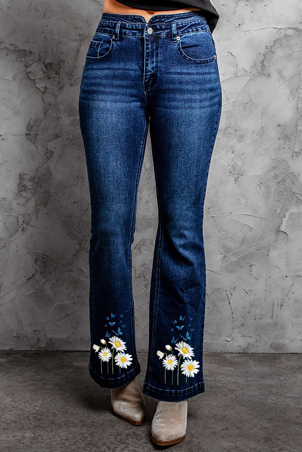 Daisy Print High Waist Flare Jeans showcasing a stylish floral pattern and a flattering high waist design.