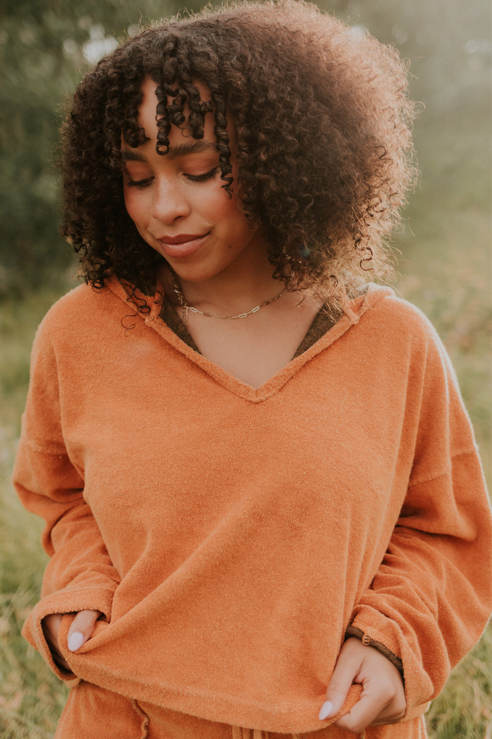 Dance With Life Hoodie in vibrant colors, featuring a soft v-neck and modern seam details, made from 100% organic cotton.