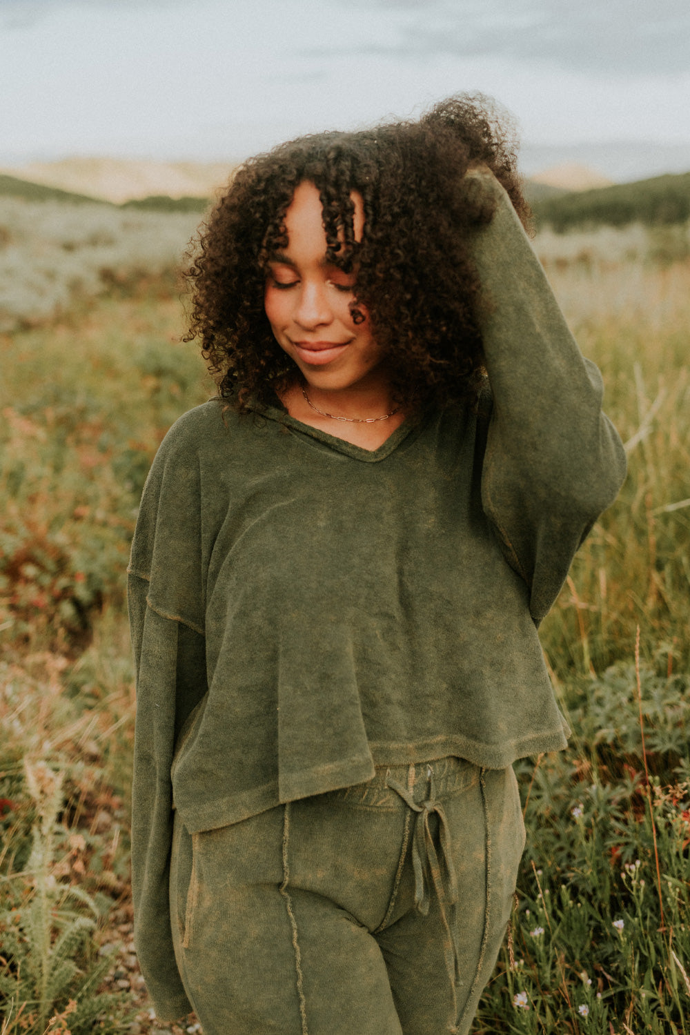 Dance With Life Hoodie in vibrant colors, featuring a soft v-neck and modern seam details, made from 100% organic cotton.