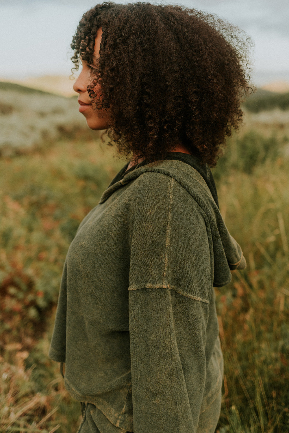 Dance With Life Hoodie in vibrant colors, featuring a soft v-neck and modern seam details, made from 100% organic cotton.