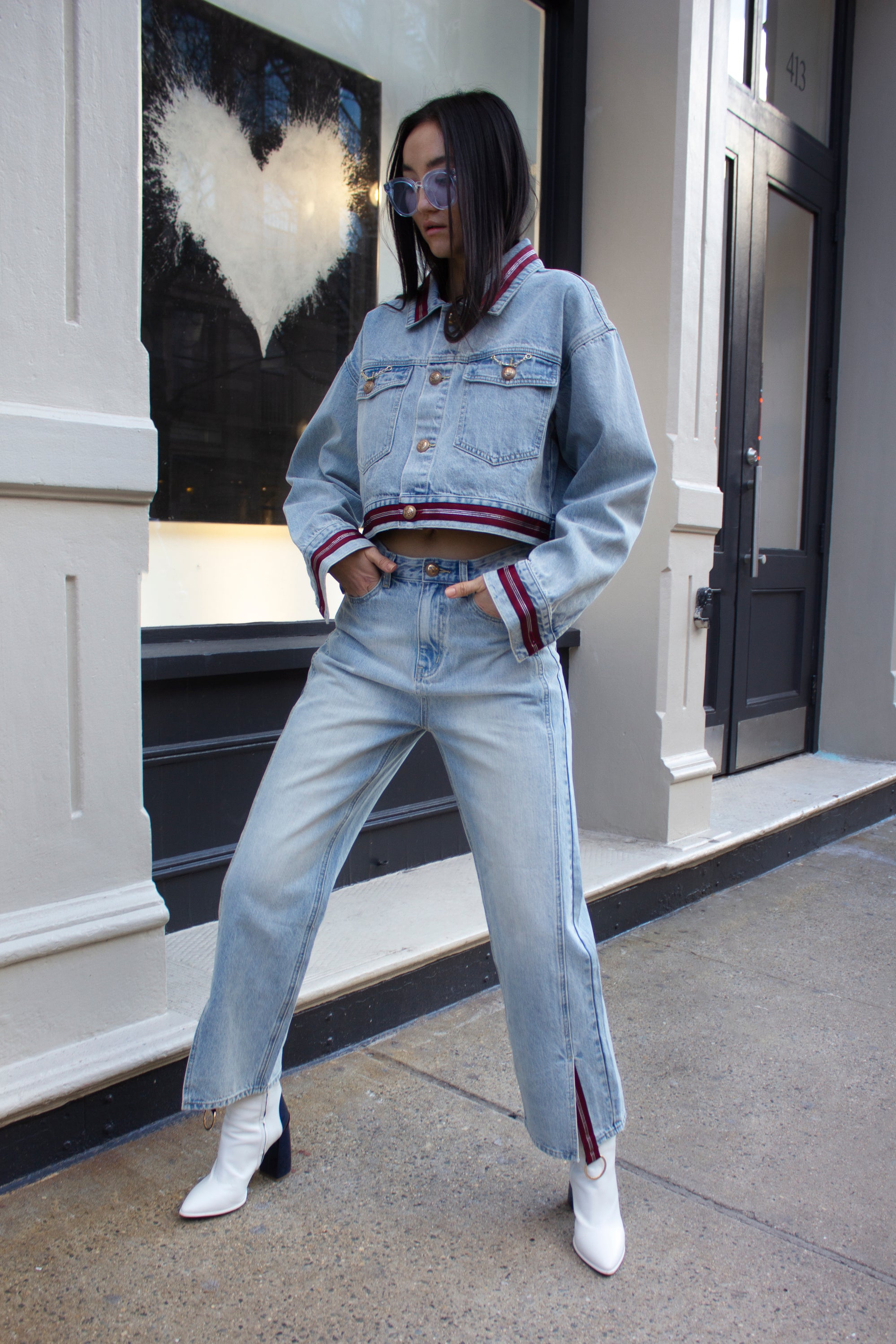 A pair of stylish Danielle Boyfriend Jeans displayed on a mannequin, showcasing their relaxed fit and 100% cotton fabric.