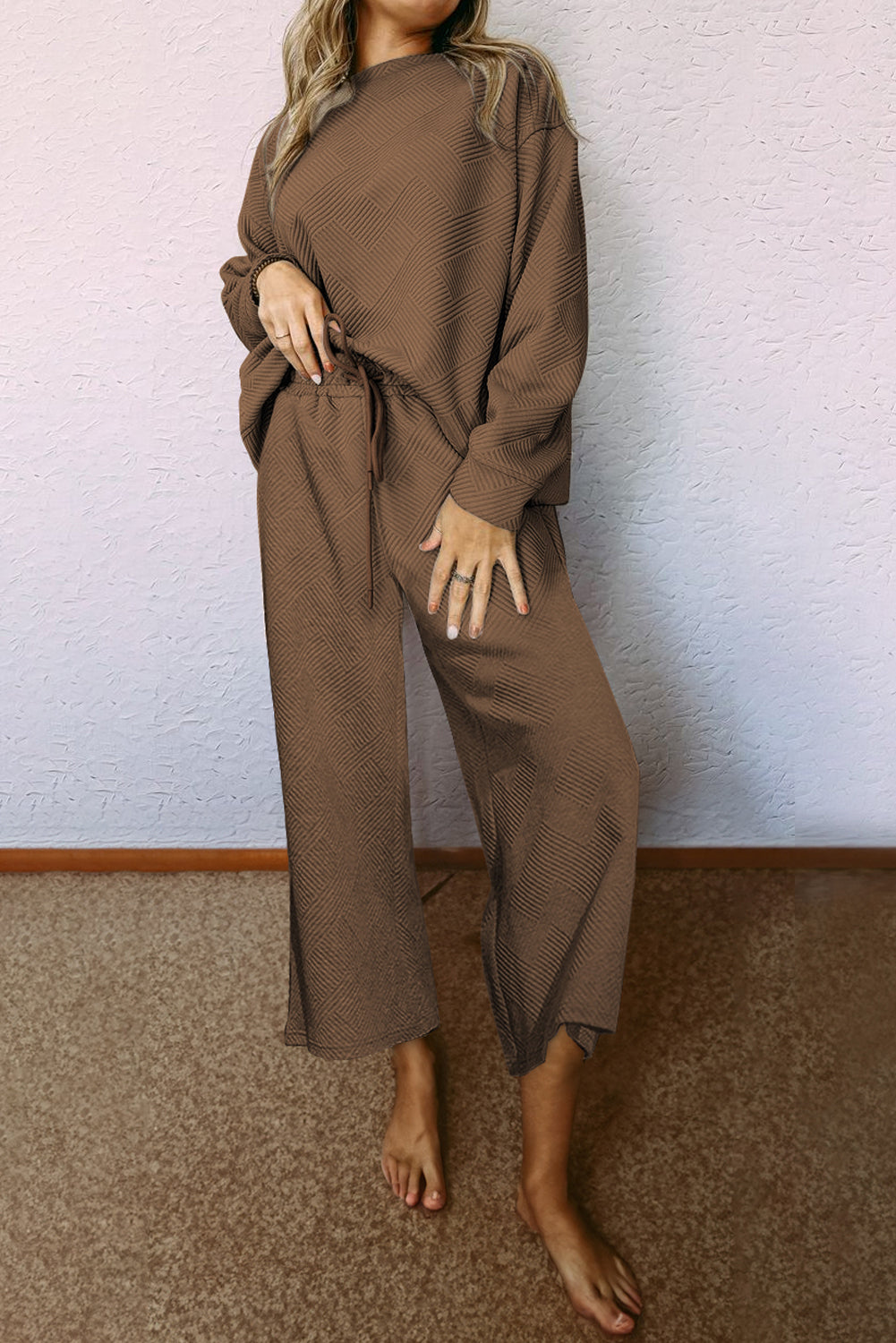 Dark brown ultra loose textured 2-piece slouchy outfit featuring a long-sleeved top and wide-leg pants with drawstrings.