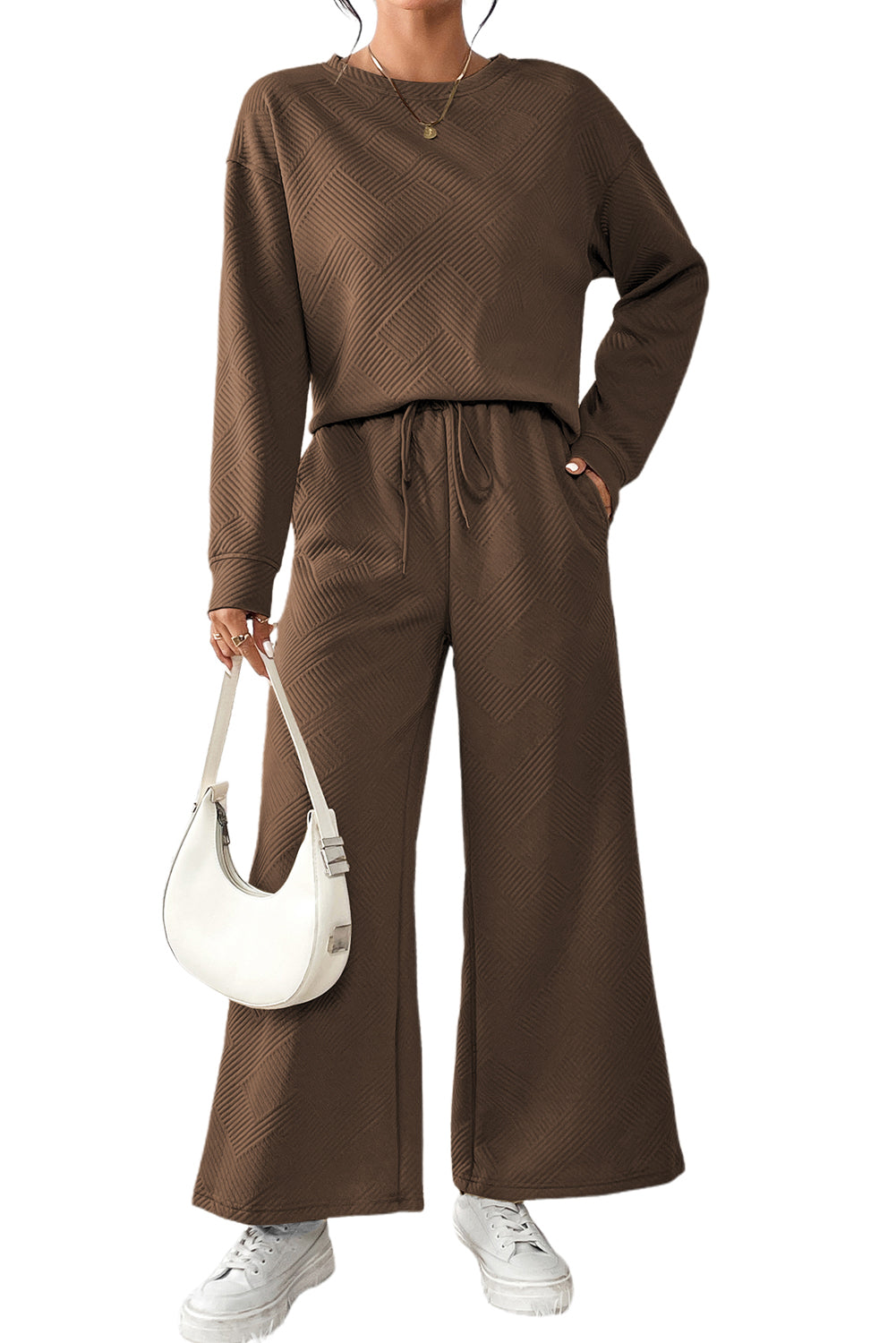 Dark brown ultra loose textured 2-piece slouchy outfit featuring a long-sleeved top and wide-leg pants with drawstrings.