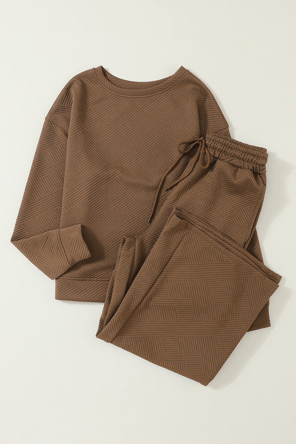 Dark brown ultra loose textured 2-piece slouchy outfit featuring a long-sleeved top and wide-leg pants with drawstrings.