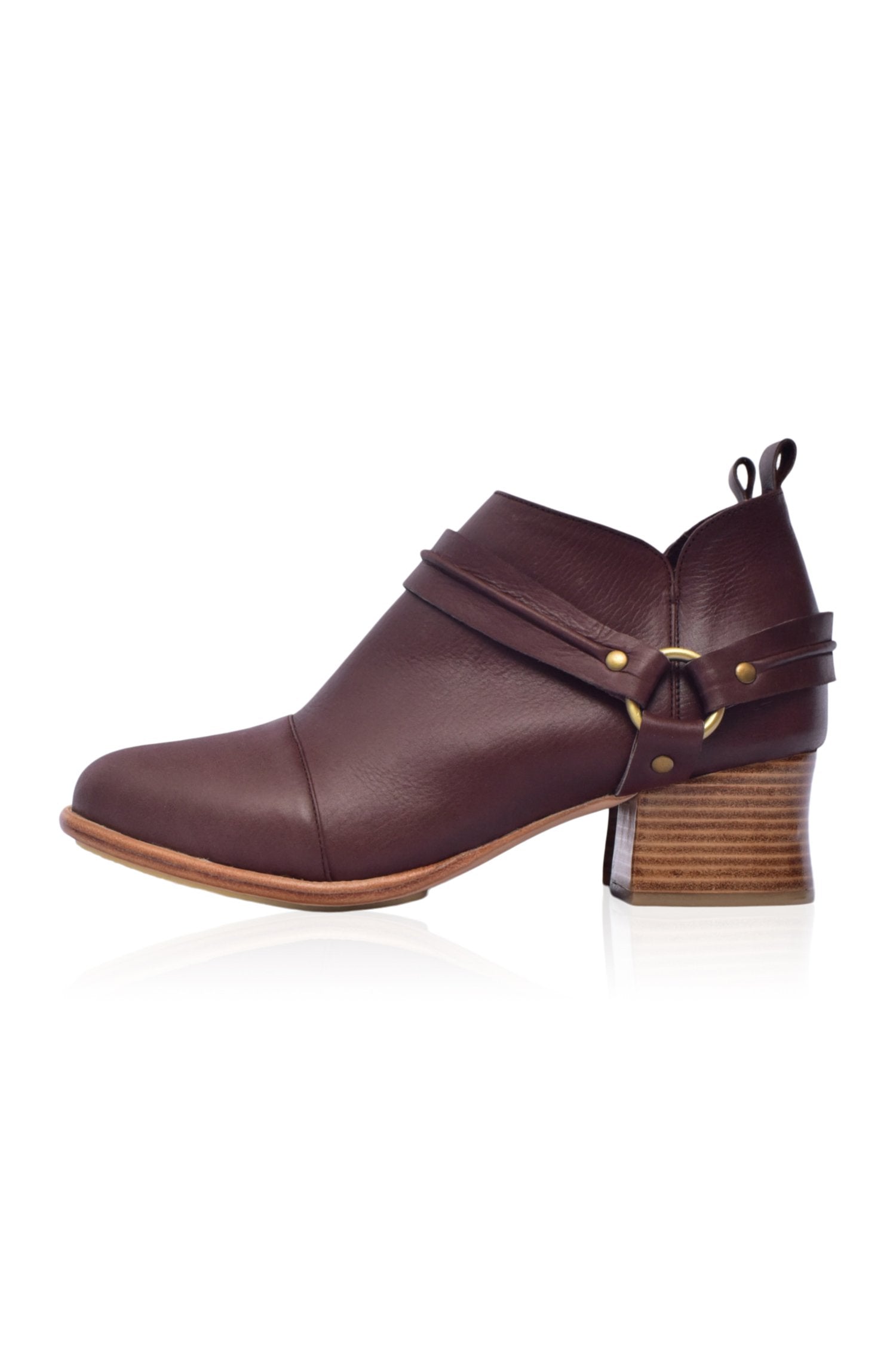 Dasha Low Ankle Booties in genuine leather with wild-west strap detailing, showcasing a stylish low-cut silhouette and a stacked wooden block heel.