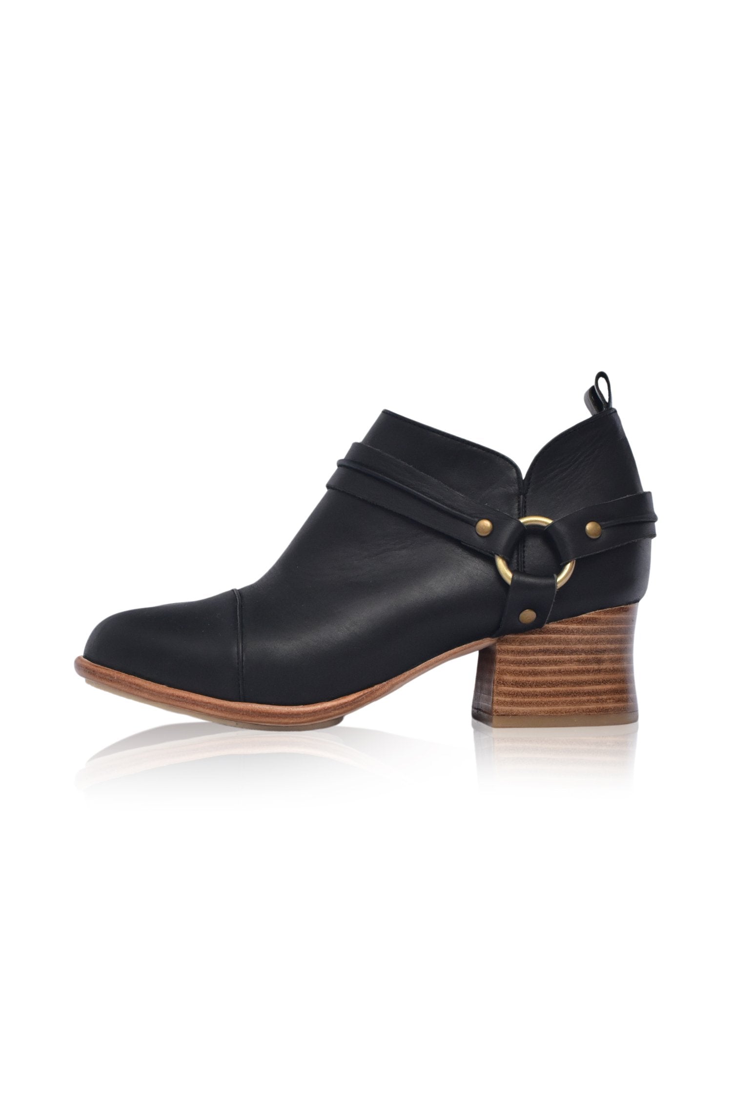 Dasha Low Ankle Booties in genuine leather with wild-west strap detailing, showcasing a stylish low-cut silhouette and a stacked wooden block heel.