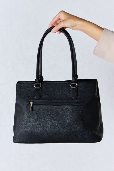 David Jones Structured Leather Handbag in sleek design, showcasing its medium size and faux leather material.