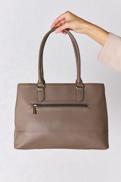 David Jones Structured Leather Handbag in sleek design, showcasing its medium size and faux leather material.