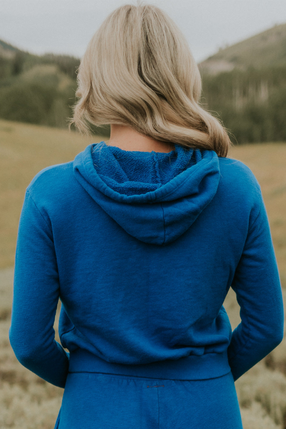 Day Break Hoodie 2.0 in Cream, showcasing its vintage cropped design and soft organic cotton fabric.