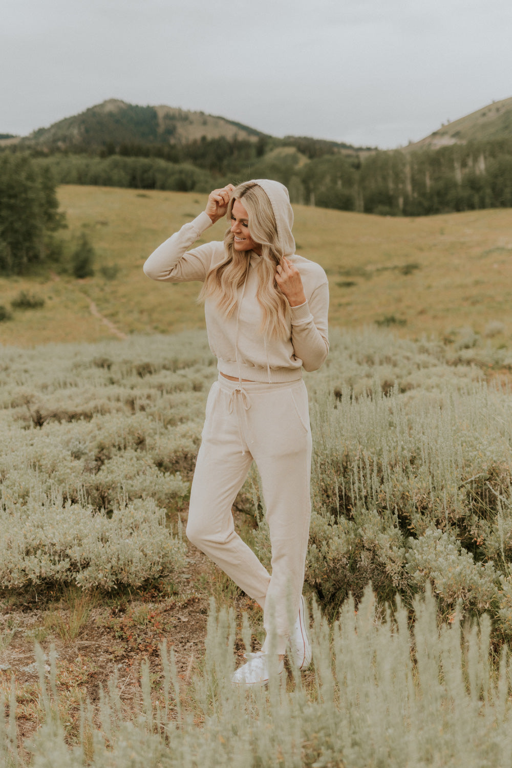 Day Break Hoodie 2.0 in Cream, showcasing its vintage cropped design and soft organic cotton fabric.