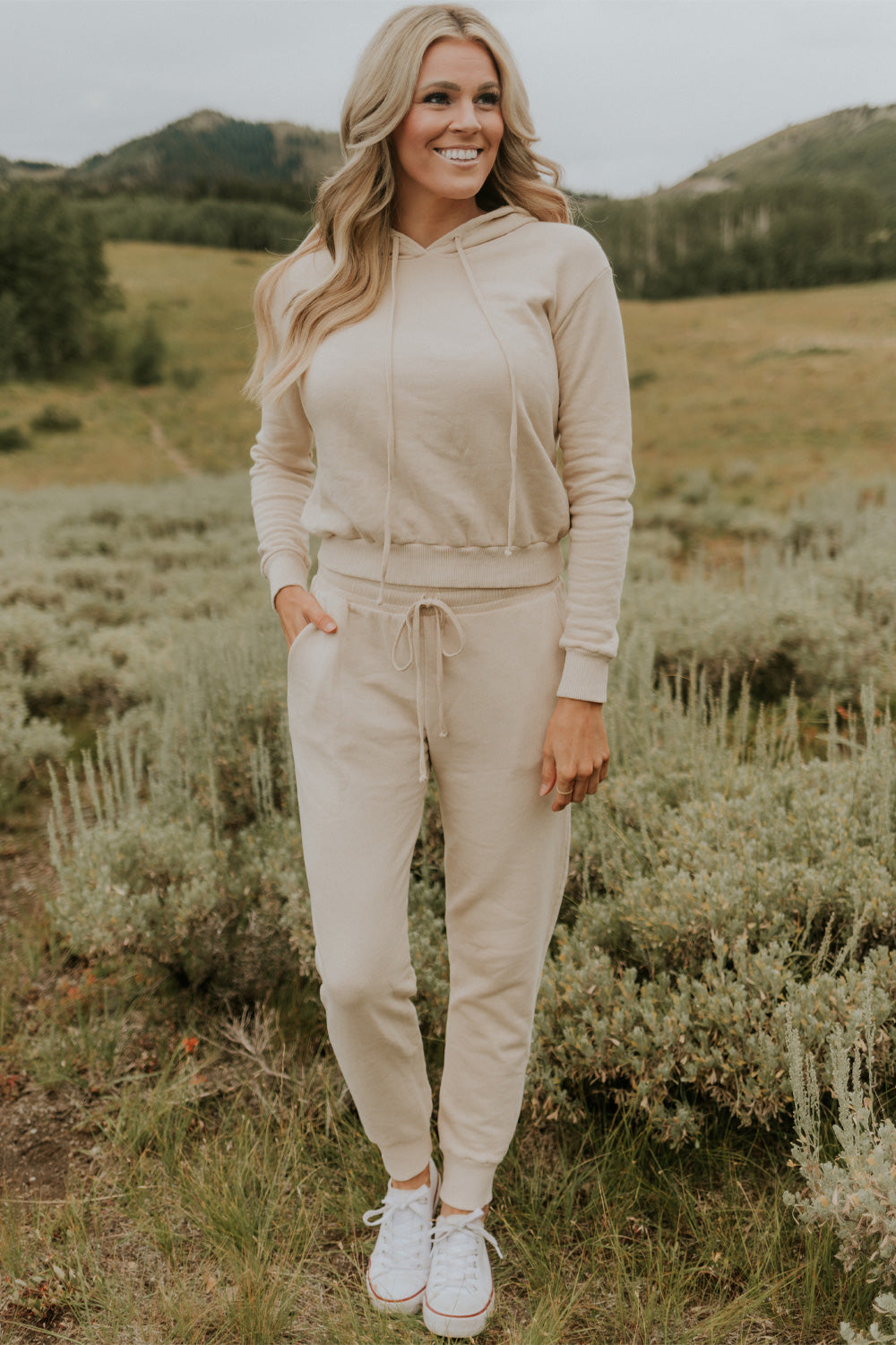 Day Break Hoodie 2.0 in Cream, showcasing its vintage cropped design and soft organic cotton fabric.