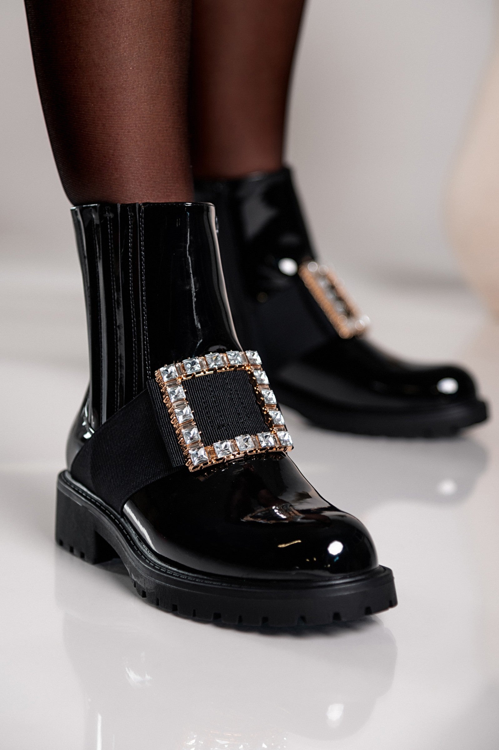 Black decorative buckle fashion ankle boots Yata with high heel and zip closure, showcasing stylish design and comfort.