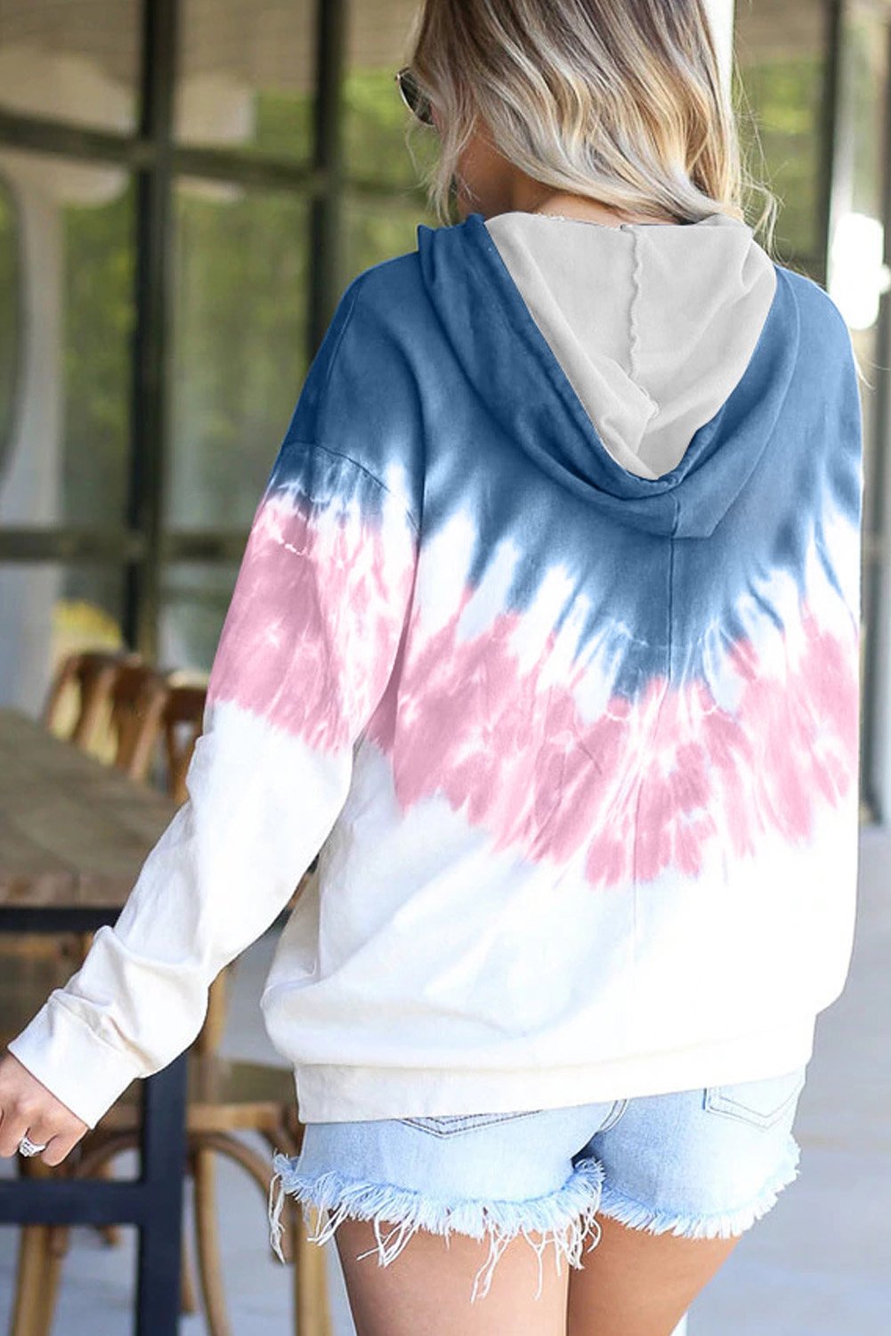 Demi Tie-dye Hoodie featuring a stylish tie-dye print, oversized fit, and kangaroo pocket, perfect for casual wear.